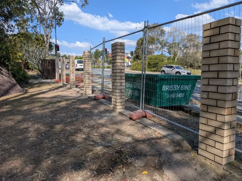 Brick entry pillars and fence at a Gold Coast property