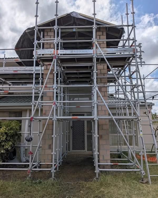 Front facade brickwork under scaffold on a Gold Coast home