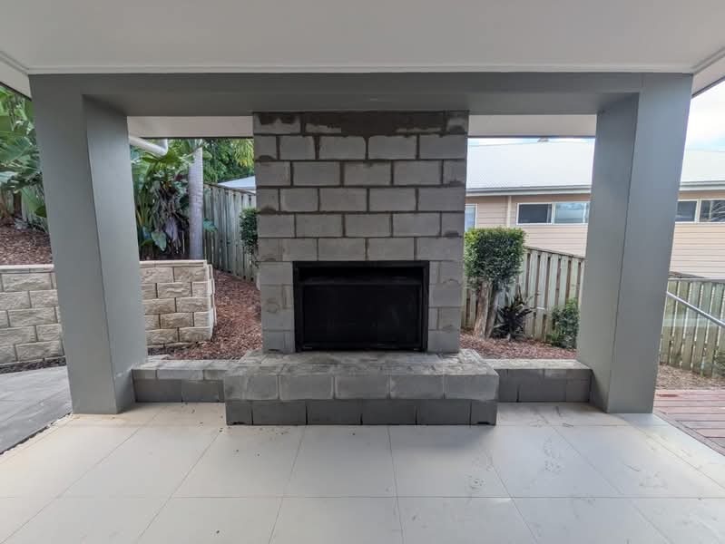 Outdoor brick fireplace built by Gold Coast Pro Bricklayers